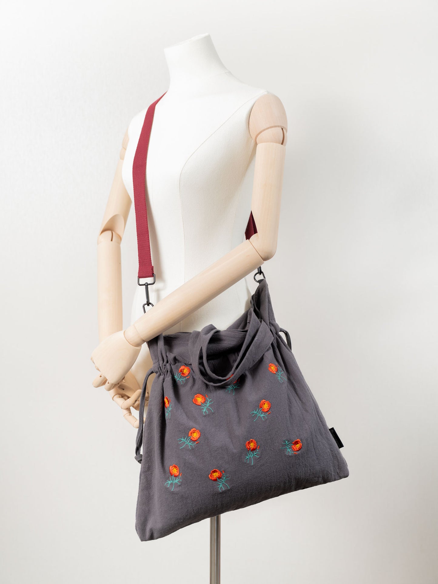 【heyhokiii】Machine - Embroidered Corn Poppy Cotton Drawstring Bag: A Blend of Precision and Practicality