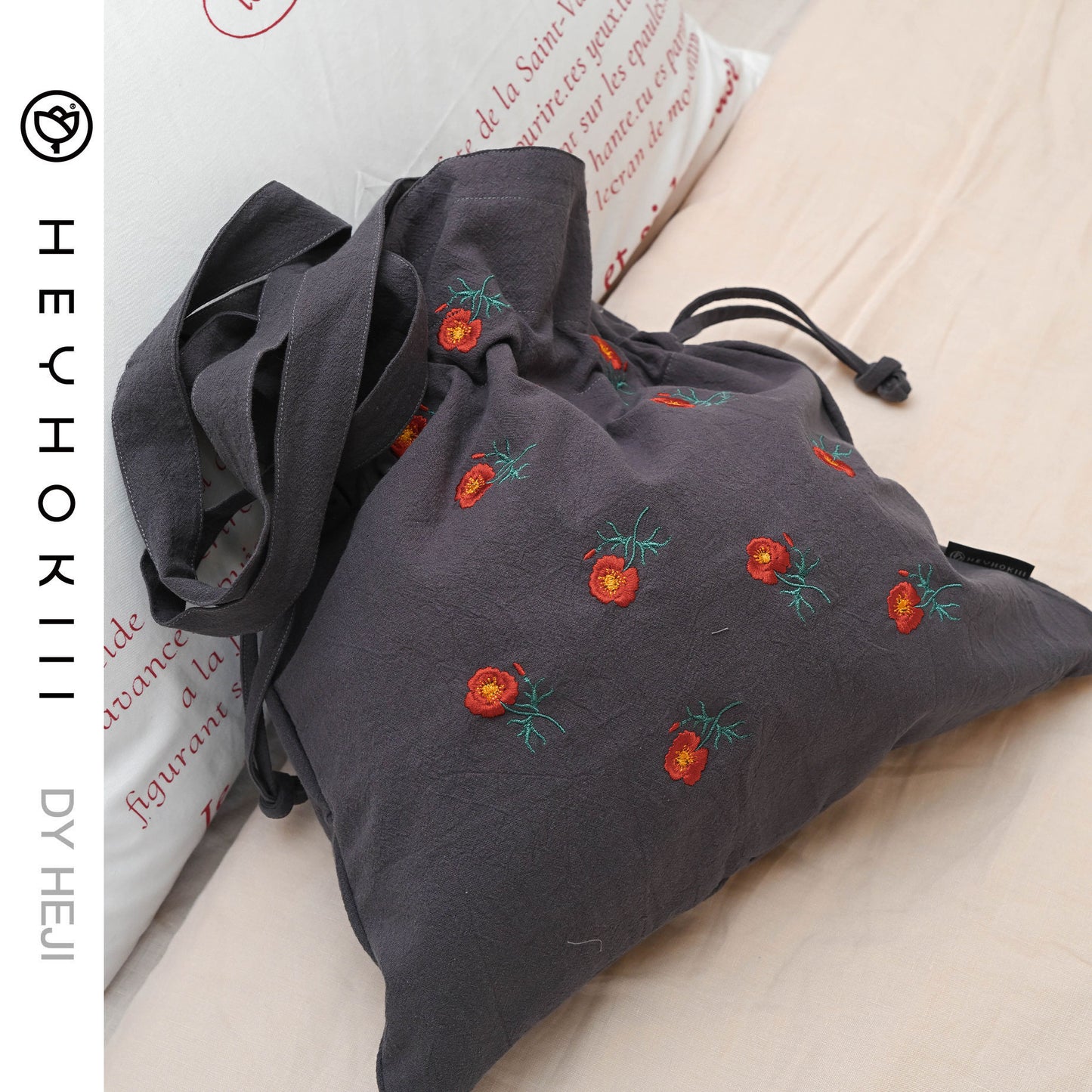 【heyhokiii】Machine - Embroidered Corn Poppy Cotton Drawstring Bag: A Blend of Precision and Practicality