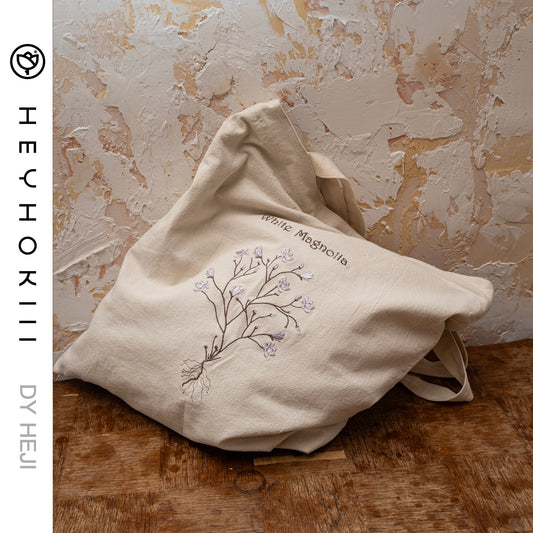 【heyhokiii】Machine-Embroidered Magnolia Cotton Drawstring Bag: Timeless Elegance in Every Stitch